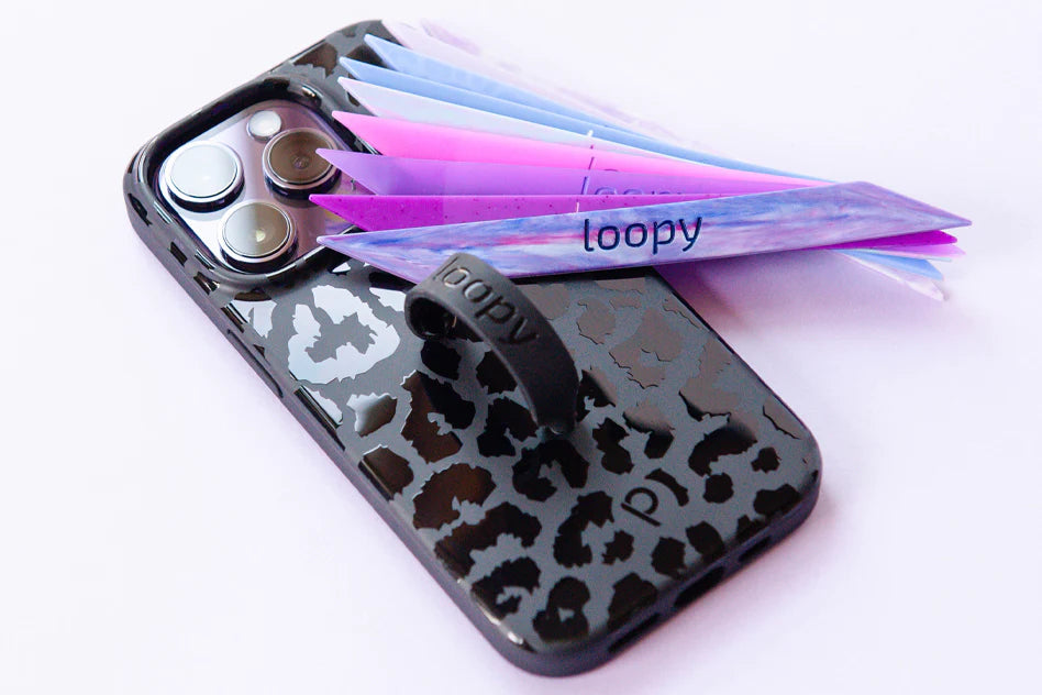 Person holding a Loopy phone case